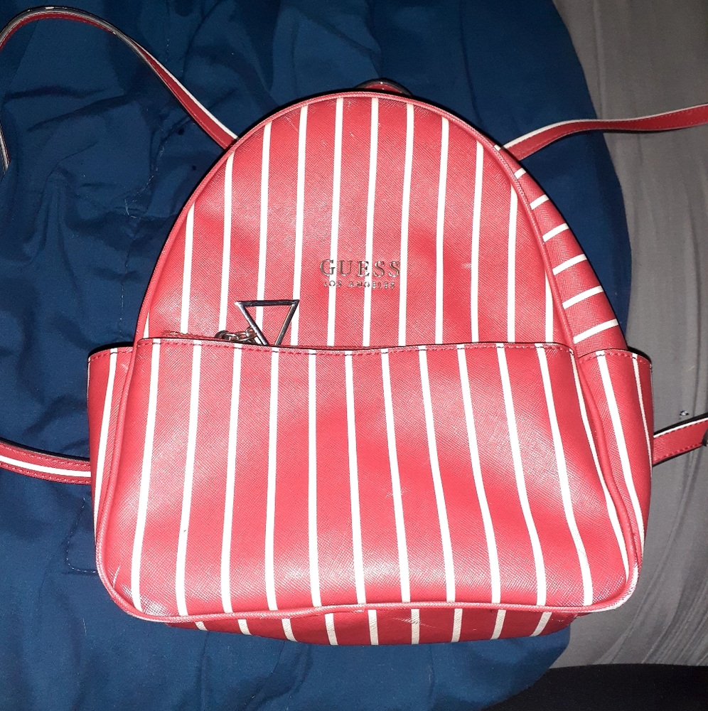 Red and white striped Guess mini backpack
